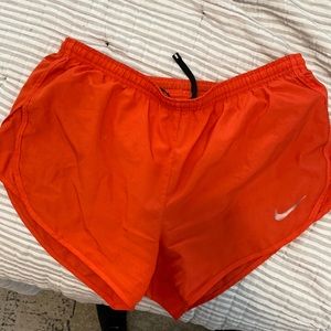 Nike running shorts bright red